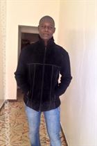 Kheuch23 a man of 40 years old living at Dakar looking for a young woman