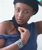 Latifa9 a woman of 28 years old living in Burkina Faso looking for some men and some women