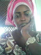 Solange11 a woman of 41 years old living in Bénin looking for some men and some women