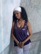 Mariam56 a woman of 34 years old living at Glasgow looking for some men and some women