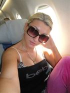 Sandrine25 a woman of 41 years old living in France looking for some men and some women