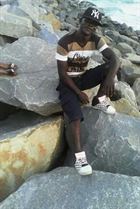 Marcelin3 un homme de 38 ans vivant au Togo recherche des hommes et des femmes