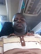 Chiffis a man of 40 years old living in Côte d'Ivoire looking for a young woman
